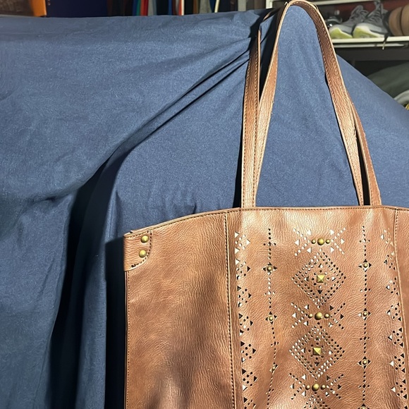 Lucky Brand brown studded purse with cutouts and Teal & horseshoe print lining. - Picture 3 of 8